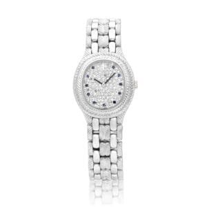 Audemars Piguet. A white gold, diamond and sapphire-set bracelet watch. 1990
