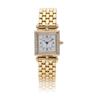 Classique, a yellow gold quartz wristwatch