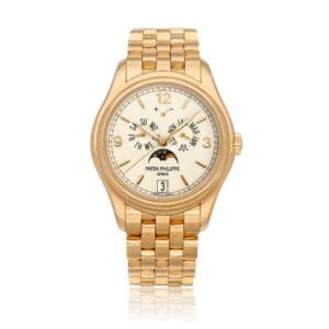 Patek Philippe Annual Calendar (Reference 5146). A pink gold automatic wristwatch with day, date, moon phases and power reserve indication, 2014