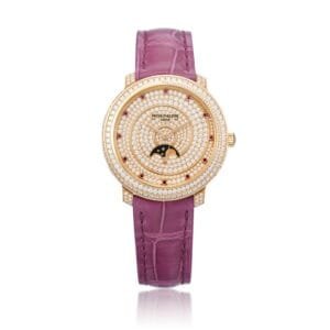 Patek Philippe Complications (Reference 4968/400r-001). A rose gold ruby and diamond set wristwatch with moon phase. 2016