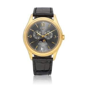 Patek Philippe Complications (Reference 5146). A yellow gold annual calendar and moon phases wristwatch. circa 2005
