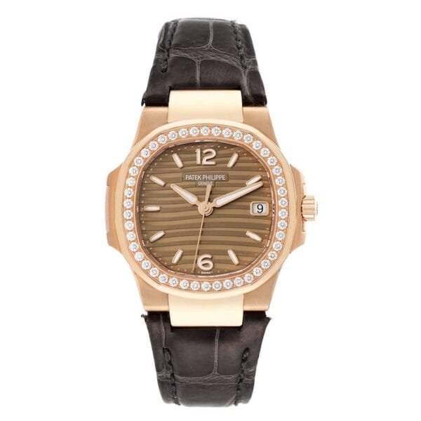 Patek Philippe Nautilus (Reference 7010R-012). A rose gold diamond-set quartz wristwatch with date.