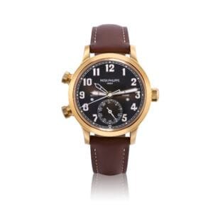 Patek Philippe Pilot Travel Time (Reference 7234). A pink gold dual time zone wristwatch with date and day and night indication. circa 2022