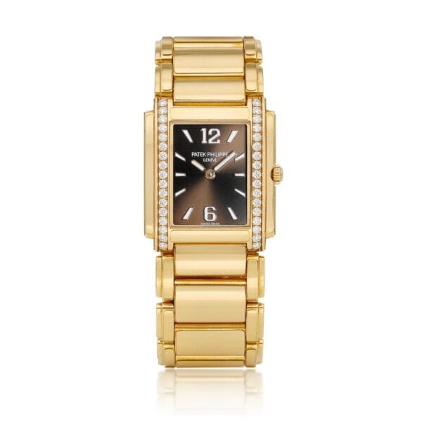 Patek Philippe Twenty~4 (Reference 4910). A pink gold and diamond-set wristwatch with bracelet. Circa 2022