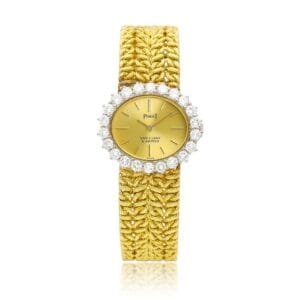 Piaget (Reference 9330 N19). A yellow gold and diamond-set bracelet watch, retailed by Van Cleef & Arpels. circa 1980