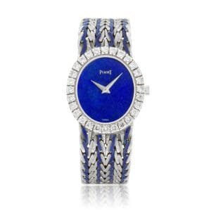 Piaget (Reference 9814 E43). A white gold and diamond-set bracelet watch with lapis lazuli dial. circa 1975