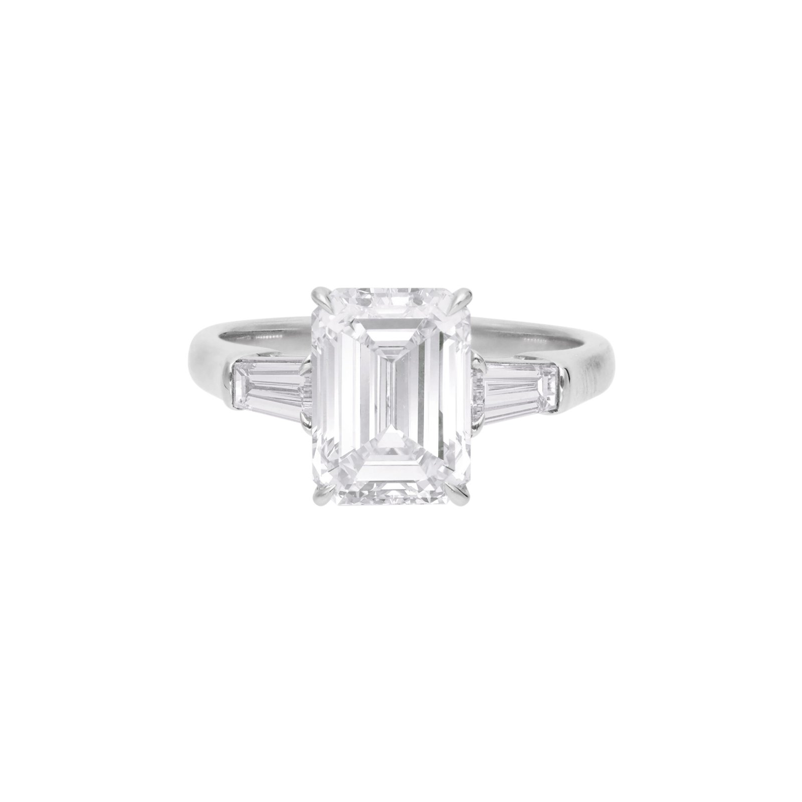 Platinum and 3.01ct Emerald Cut Diamond Three Stone Engagement Ring