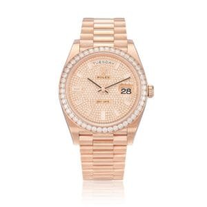 Rolex Day-Date (Reference 228345RBR). A everose gold diamond-set wristwatch with bracelet. circa 2018