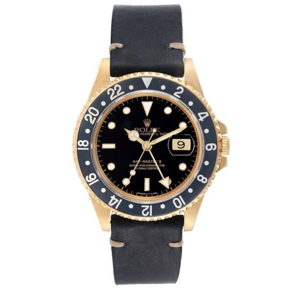 Rolex GMT Master II (Reference 16718). A yellow gold automatic wristwatch with date. 1991