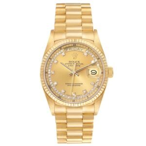 Rolex President Day-Date (Reference 18038). A yellow gold diamond-set automatic wristwatch with day and date. 1986-1987.
