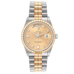 Rolex President Day-Date Tridor (Reference 18129). A yellow gold and stainless steel diamond-set automatic wristwatch with date and day. 1985-1986