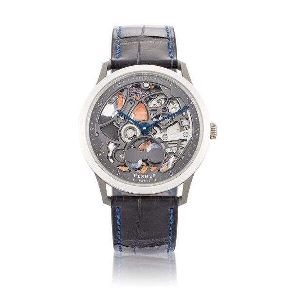 Slim d' Hermès Squelette Lune Reference CA6.841, a white gold and titanium wristwatch, circa 2021