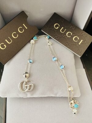 Ladies Unworn Gucci Sterling Silver GG Logo Topaz Turquoise Necklace Box Papers