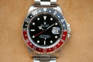 ROLEX GMT II 16710 RED AND BLACK “COKE” BEZEL U SERIAL SWISS T DIAL