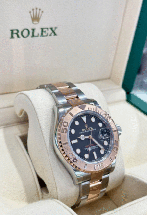 Rolex Yacht-Master 40 126621 18k EverRose Gold with Black Dial PreOwned B/PAPERS