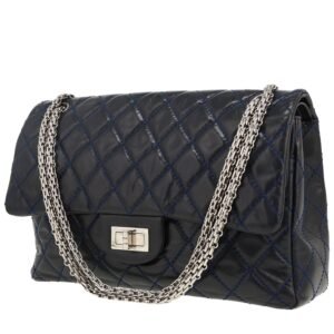 Chanel 2.55 handbag in navy blue quilted leather