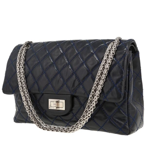 Chanel 2.55 handbag in navy blue quilted leather