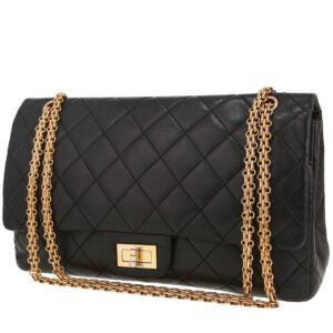 Chanel 2.55 large model handbag in black quilted grained leather
