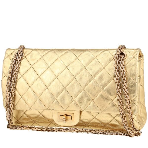 Chanel 2.55 large model handbag in gold quilted leather
