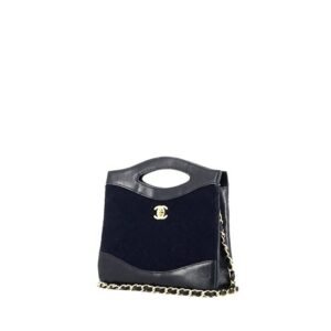Chanel 31 shoulder bag in navy blue quilted jersey and navy blue leather