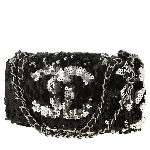 Chanel Baguette handbag in black and silver paillette and black leather