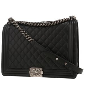 Chanel Boy Maxi handbag in black quilted leather