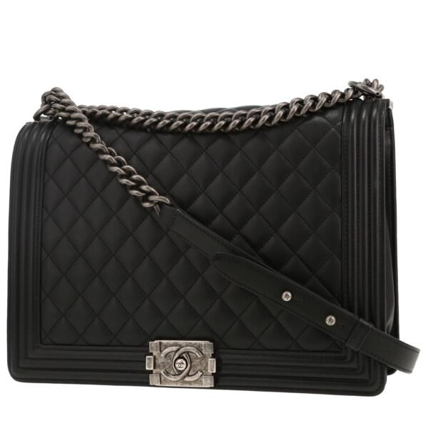 Chanel Boy Maxi handbag in black quilted leather