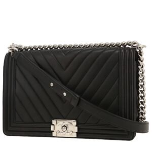 Chanel Boy shoulder bag in black chevron quilted leather
