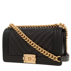 Chanel Boy shoulder bag in black quilted grained leather