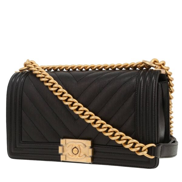 Chanel Boy shoulder bag in black quilted grained leather