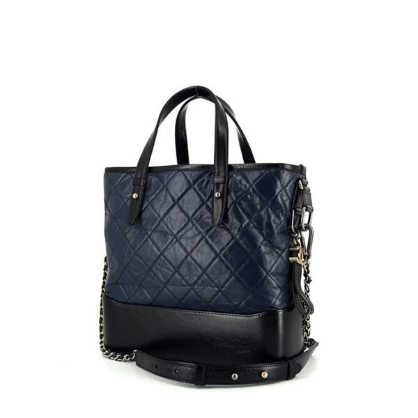 Chanel Gabrielle medium model shoulder bag in navy blue quilted leather and black smooth leather