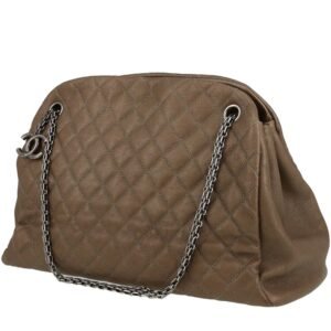 Chanel Mademoiselle large model bag worn on the shoulder or carried in the hand in taupe quilted grained leather