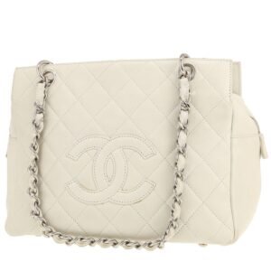 Chanel Petit Shopping handbag in cream color quilted leather