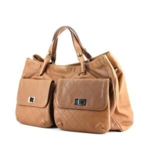 Chanel Pocket in the city handbag in brown quilted grained leather