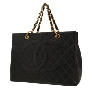 Chanel Shopping GST handbag in black quilted grained leather