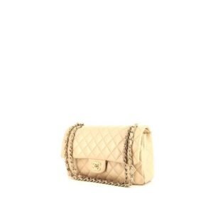 Chanel Timeless Classic handbag in beige quilted leather