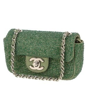 Chanel Timeless Extra Mini shoulder bag in green glittering leather