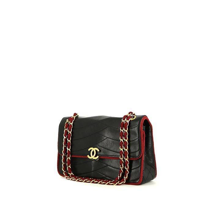 Chanel Vintage handbag in blue quilted leather and red piping