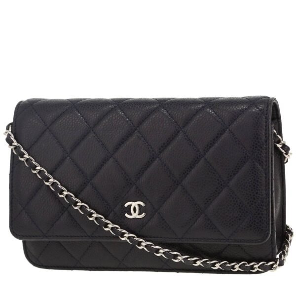 Chanel Wallet on Chain shoulder bag in navy blue quilted grained leather