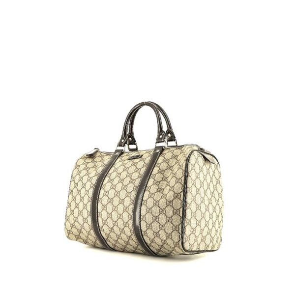 Gucci Boston handbag in beige monogram canvas and brown leather
