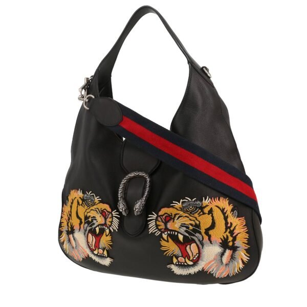 Gucci Dionysus bag worn on the shoulder or carried in the hand in black leather