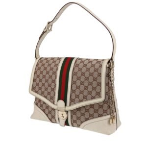Gucci Vintage handbag in beige monogram canvas and cream color leather
