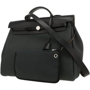 Hermès Herbag bag worn on the shoulder or carried in the hand in black canvas and black leather