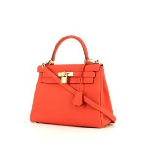 Hermès Kelly 28 cm handbag in orange Capucine togo leather