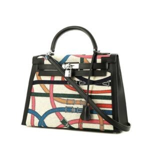 Hermès Kelly 32 cm Cavalcadour handbag in beige canvas and black leather