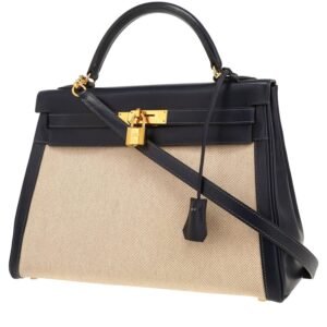 Hermès Kelly 32 cm handbag in navy blue box leather and beige canvas