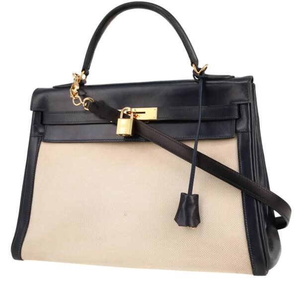 Hermès Kelly 32 cm handbag in navy blue box leather and beige canvas