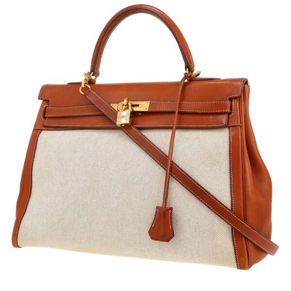 Hermès Kelly 35 cm handbag in fawn Barenia leather and beige canvas