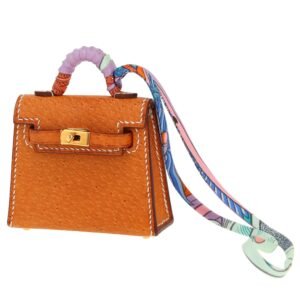 Hermès Kelly Twilly bag charm handbag/clutch in brown Pecari leather and multicolor silk