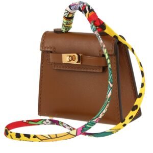 Hermès Kelly Twilly bag charm handbag/clutch in gold Tadelakt leather and multicolor silk